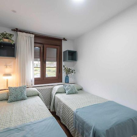 Apartamentos La Corrada De Andrin Bagian luar foto